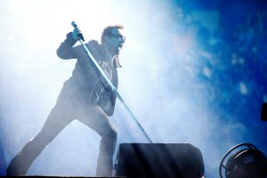 Bono performing with U2